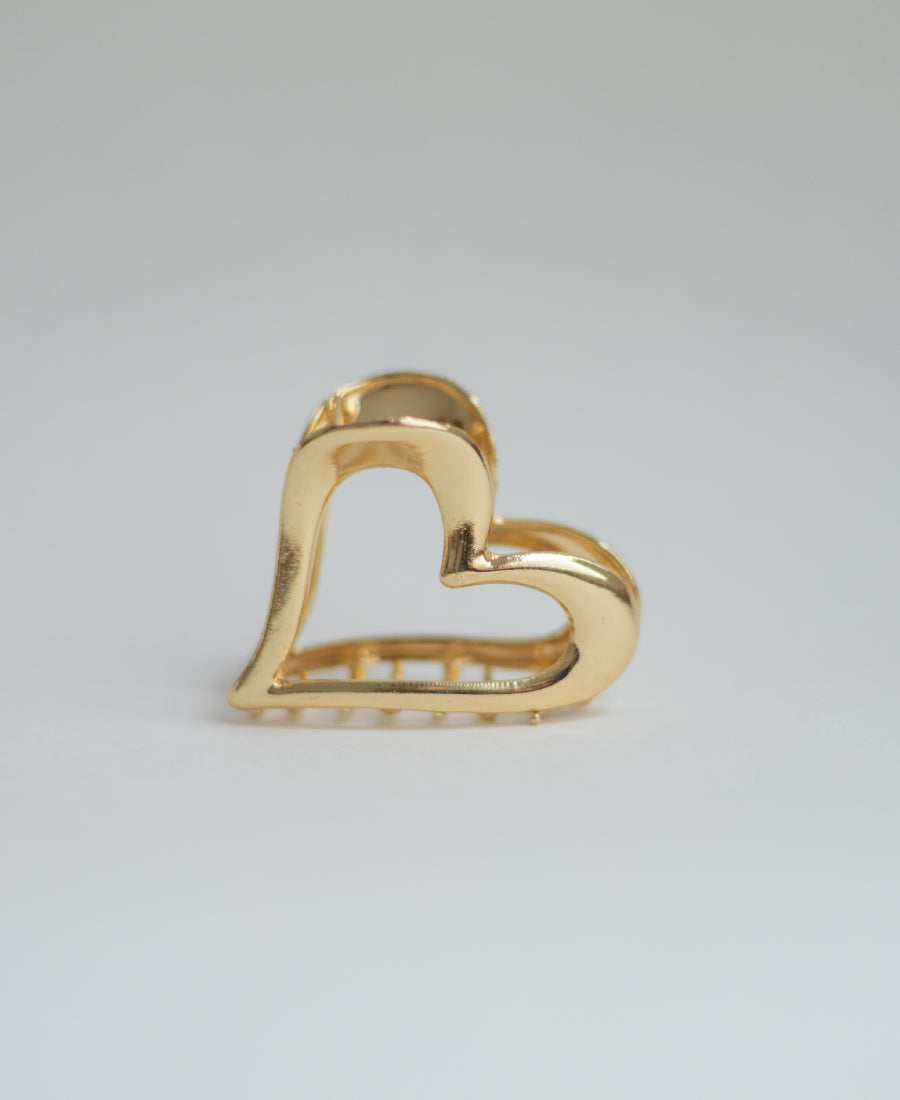 Pince à cheveux dorée – Forme cœur ajouré